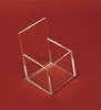 Clear acrylic box in front of red background